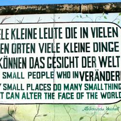 A graffiti wall in Germany encouraging climate action. It contains a quote, reading "Many small people, in many small places, do many small things that can alter the face of the world".