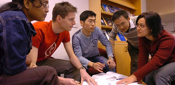 Research students from the Department of Physics. Research students from the Department of Physics, engaging in discussion, with the help of funds from the AHSS Research Framework.