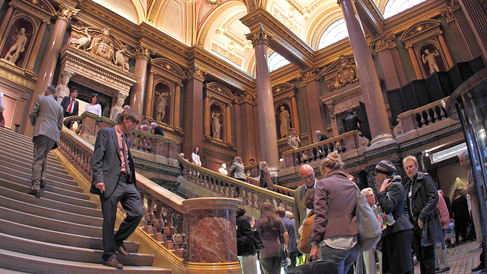 People in the main entrance lobby of the Fitzwilliam Museum.