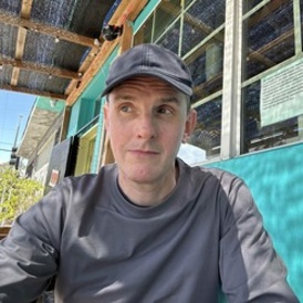 Portrait head-shot of Professor Nicholas Guyatt