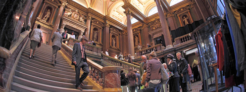 People in the main entrance lobby of the Fitzwilliam Museum.