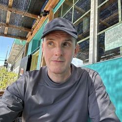 Portrait head-shot of Professor Nicholas Guyatt