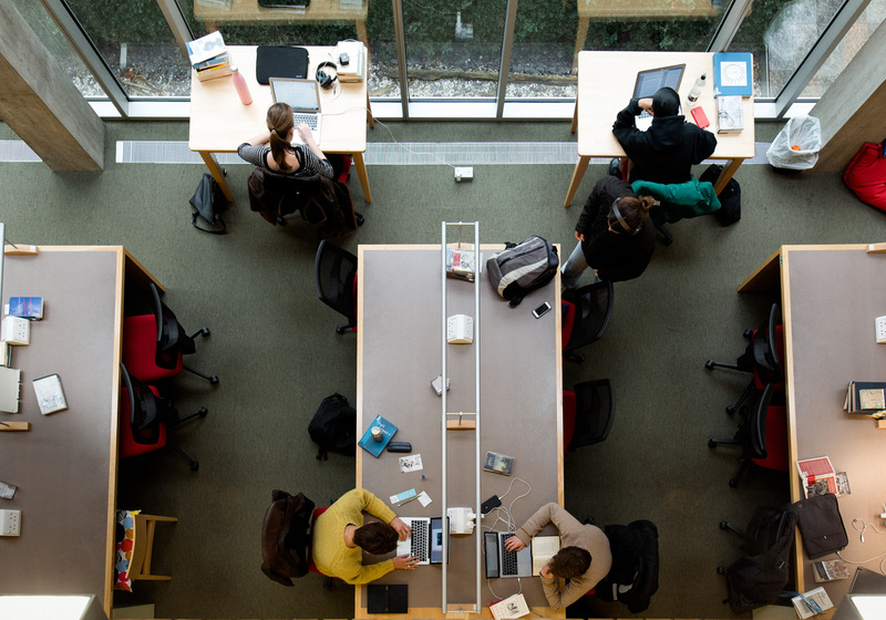 View from above of students working at desks in English Faculty